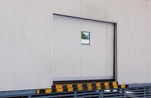 Large loading door of the warehouse. photo