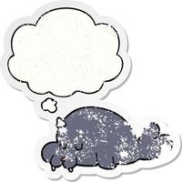 cartoon walrus and thought bubble as a distressed worn sticker vector