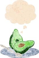 cartoon avocado and thought bubble in retro textured style vector