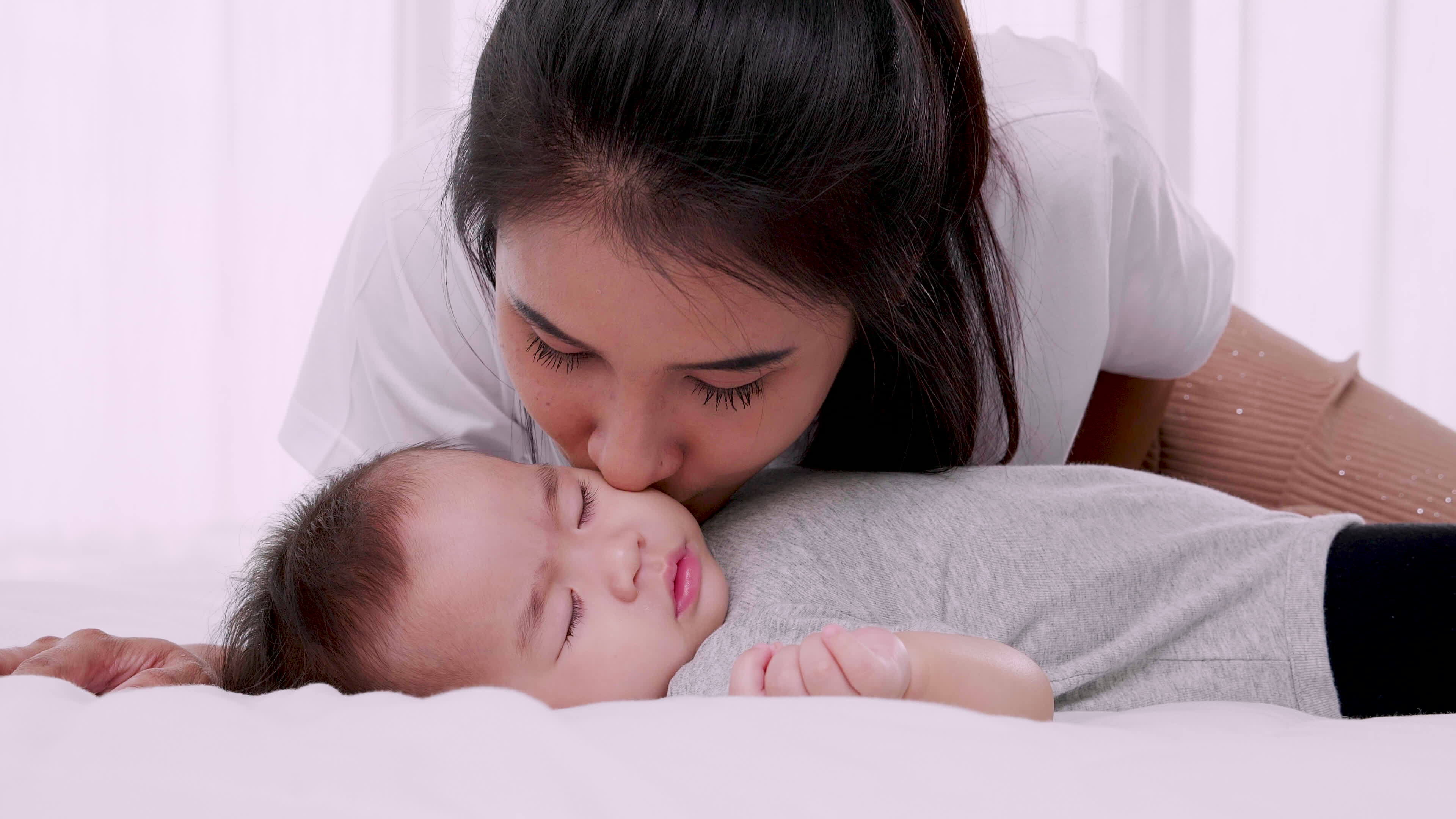 Mother Kissing Stock Video Footage for Free Download