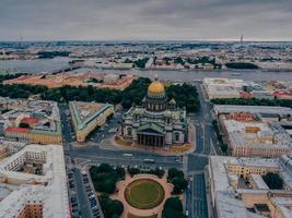 View from height of St Isaacs Cathedral, dark cloudy sky. Architectural monument. Center of Petersburg. Panoramic view. St Isaacs Square photo