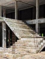 Unfinished concrete staircase. photo