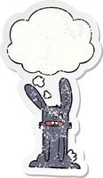 cartoon rabbit and thought bubble as a distressed worn sticker vector