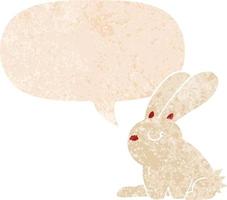 cartoon rabbit and speech bubble in retro textured style vector