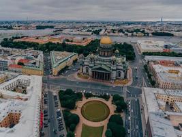 Panoramic view of St. Isaacs Cathedral on St. Isaacs Square in Russia, Saint Petersburg. Cloudy day. View from above. Historical monument. photo