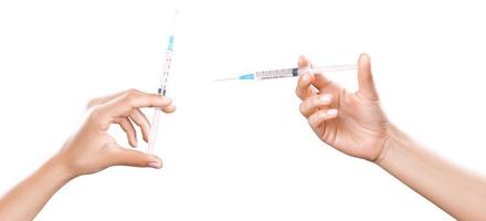 jeringa de mano con vacuna contra el virus de la corona. foto