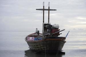 A fisherman boat on the sea photo