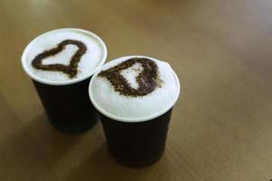 Two cups of coffee on the table photo