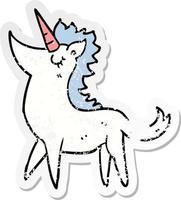 distressed sticker of a cartoon unicorn vector