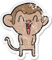 distressed sticker of a cartoon laughing monkey vector