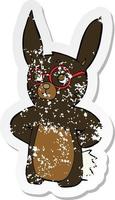 retro distressed sticker of a cartoon rabbit wearing spectacles vector