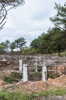 Foundation piles with the wooden frame for built the ground floor. photo