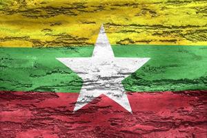 Ilustración 3d de una bandera de myanmar - bandera de tela ondeante realista foto