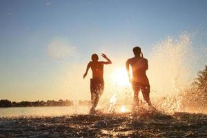 Group of friends having fun on the beach. photo