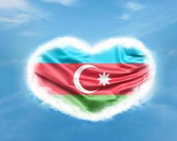 Azerbaijan flag in heart shape in blue sky photo