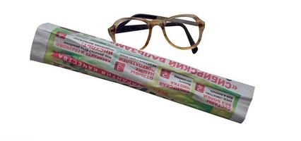 newspaper and glasses photo