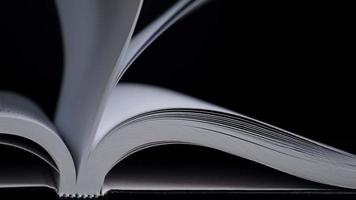 4K-Slow motion of book flip pages moving from side to side, Education and business concept. video