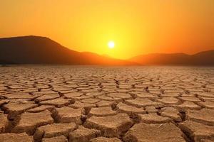 Global warming, drought, lack of rain, no seasonality The land is cracked. concept of environment change and global warming photo