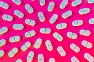 searching for the virus cure medical pills in pattern on vibrant background photo