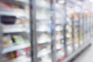 supermarket refrigerator for storage frozen food product in grocery store photo