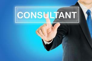 Business man is pushing CONSULTANT transparent button word over blue gradient background, business concept