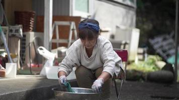 Woman dyeing indigo video