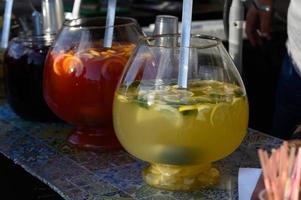 Cool lemonade in a glass container. photo