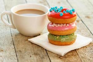 Cup of coffe and donuts photo