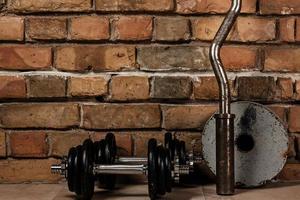 Dumbbells and barbell photo