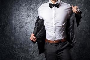 Stylish man in suit with bow tie photo