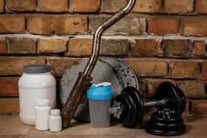 Food supplements and sport equipment photo