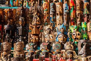 Different wooden souvenirs at the local Mexican market photo