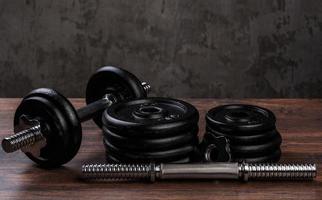 Heavy black dumbbells photo