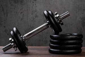 Heavy black dumbbells photo