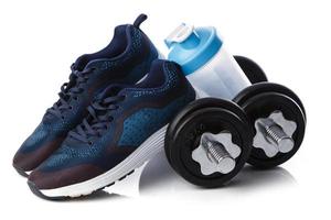 Dumbells, sneakers and shaker photo