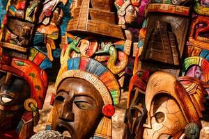 Different wooden souvenirs at the local Mexican market photo