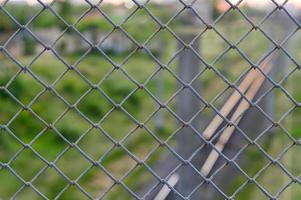 Old painted wire fence background photo