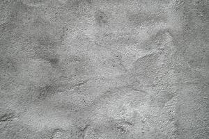 fondo de superficie de estuco gris grunge o blanco. cemento de textura de pared vieja gris sucio con fondo negro. Muro de hormigón gris, textura del fondo abstracto foto