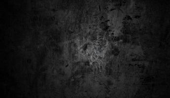 concepto de fondo de halloween de pared oscura y negra. hormigón negro polvoriento para el fondo. textura de cemento de terror foto