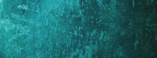 fondo de pared azul. pared de hormigón enlucida fondo de rasguño azul. textura grunge. foto