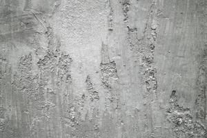 fondo de superficie de estuco gris grunge o blanco. cemento de textura de pared vieja gris sucio con fondo negro. Muro de hormigón gris, textura del fondo abstracto foto