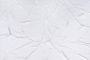 Blank paper crumpled texture and creased paper poster background. Wet crumpled paper texture backgrounds for various purposes. Realistic posters Paper crumpled texture background. photo