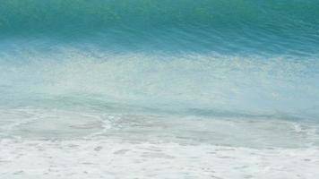Turquoise waves rolled on the beach coral sand, Koh Miang Island, Similan, slow motion Best use for relaxing video