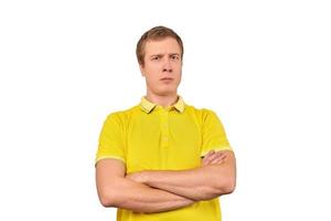 Suspicious man crossed arms on his chest, proud look isolated white background, disappointed emotion photo