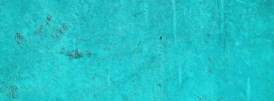 Blue wall background.concrete wall plastered blue scratch background.grunge texture. photo