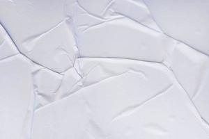 Blank paper crumpled texture and creased paper poster background. Wet crumpled paper texture backgrounds for various purposes. Realistic posters Paper crumpled texture background. photo