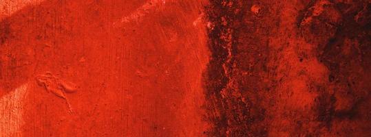 Red wall.scary background.concrete wall plastered red scratch background.grunge texture. photo