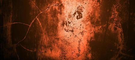 Dark red orange yellow wall halloween background concept. Scary background. Horror concrete cement texture for background. photo