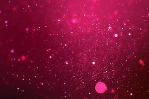 Abstract Christmas glitter lights background. Blured Christmas and New Year light. photo