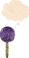 cartoon lollipop and thought bubble in retro textured style vector